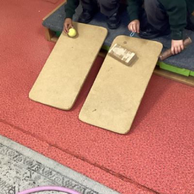 Does it roll or slide? - Exploring shapes and their properties