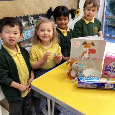 Decorating a biscuit for Kipper's birthday party