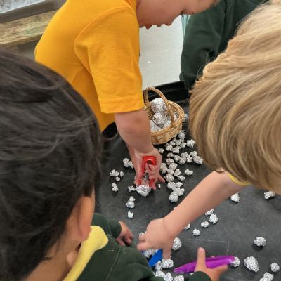 Collecting moon rocks from our trip to the moon whilst exploring 'Whatever Next!'