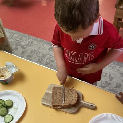 Making our own 'afternoon tea' picnic on International Day - Nursery were exploring England